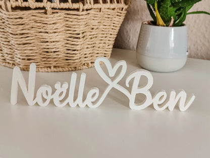 Schriftzug personalisiert mit zwei Namen und Herz